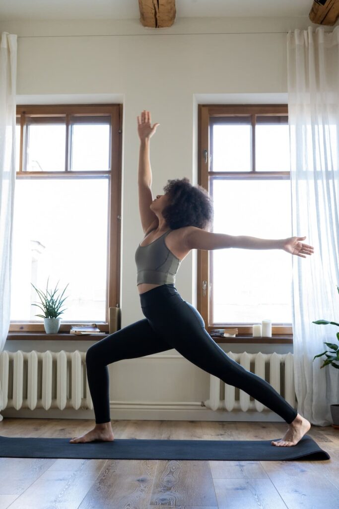 woman doing a trap yoga pose