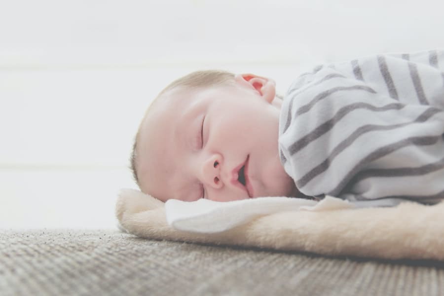 Spiritual Meanings Of Baby Laughing In Sleep